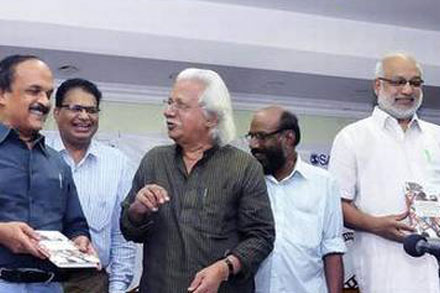 Writer Paul Zaharia and Adoor have a lighter moment.